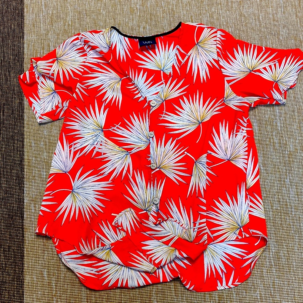 Front tie orange shirt! Wood buttons going down the front.